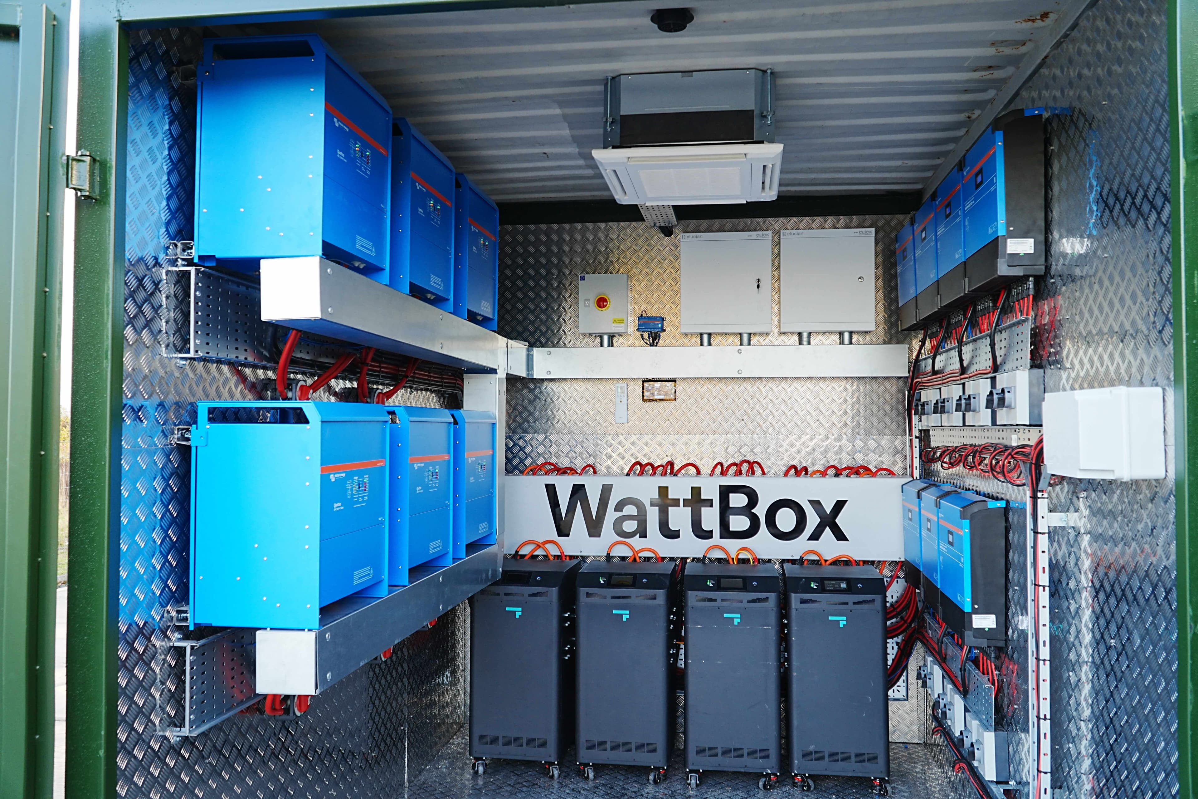 Inside a WattBox showing battery and electrical components